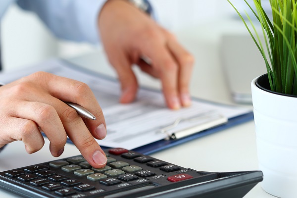 close,up,view,of,bookkeeper,or,financial,inspector,hands,making